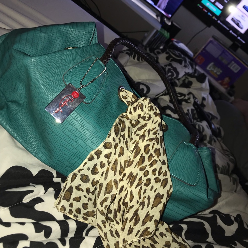 large teal purse